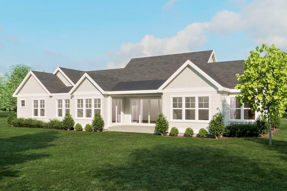 House plan exterior of a one-story home with multiple gables, numerous windows, and a covered patio area.