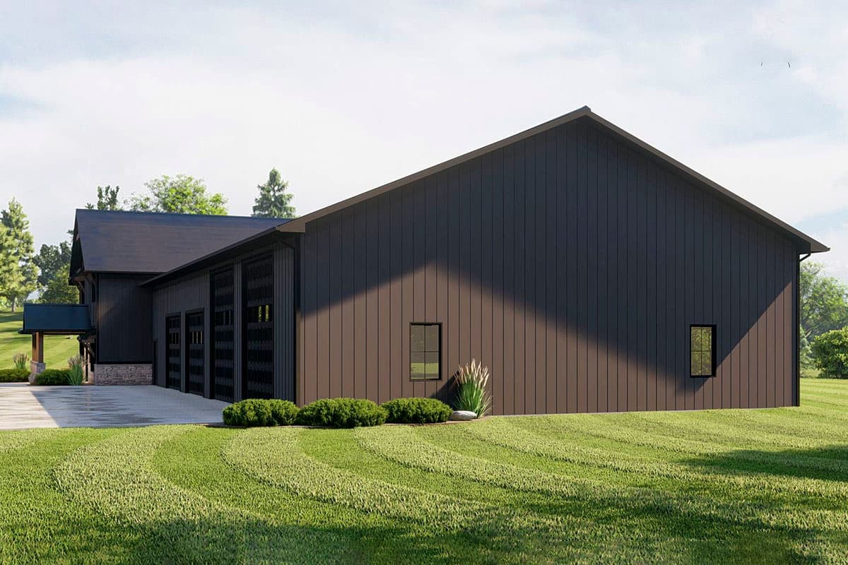 Modern house plan exterior with dark vertical siding, a dark metal roof, three garage doors, and a covered entrance.