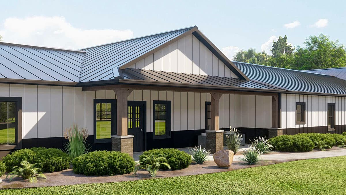 House plan exterior with a Modern Farmhouse style, metal roof, prominent gable, and covered porch with stone-clad columns.