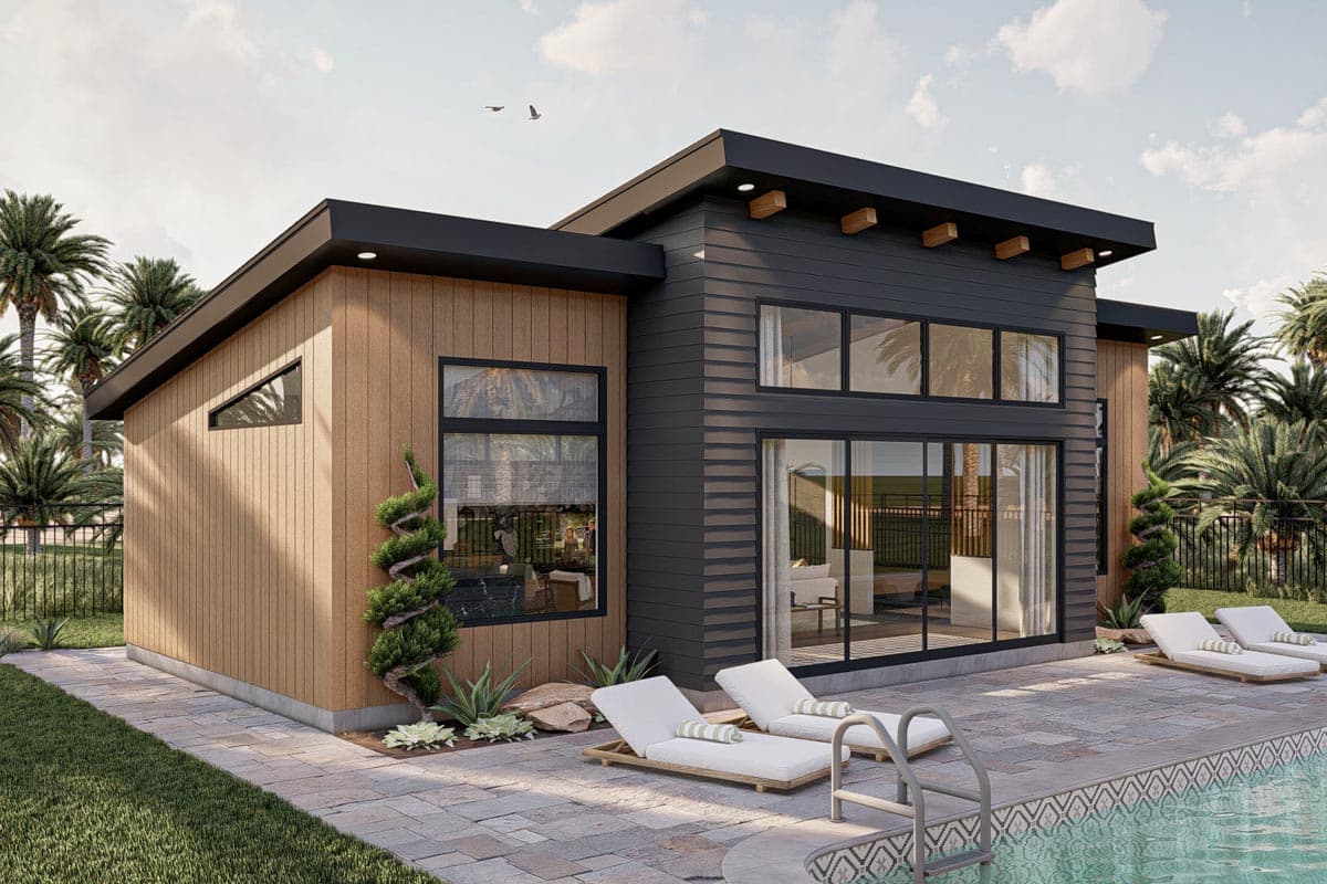 Modern one-story house plan exterior with dark siding, wood paneling, clerestory windows, and flat roof with exposed rafter tails.
