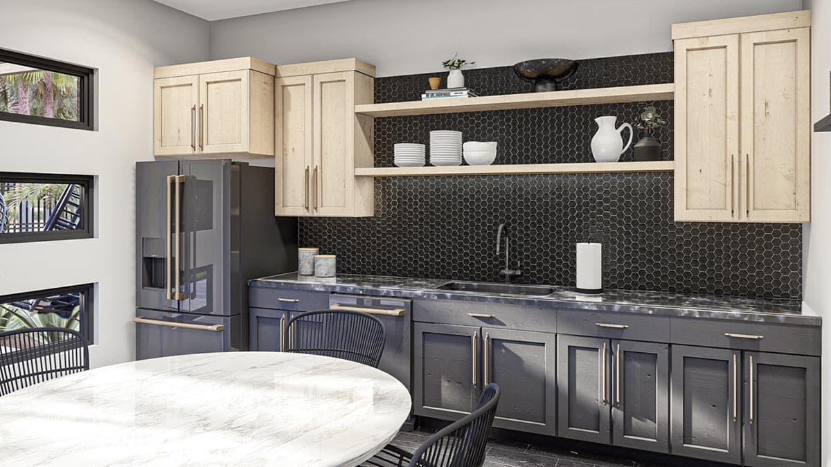 Modern kitchen with black hexagon tile backsplash, gray cabinets, light wood shelves, and a marble-topped round table. Refrigerator in background.