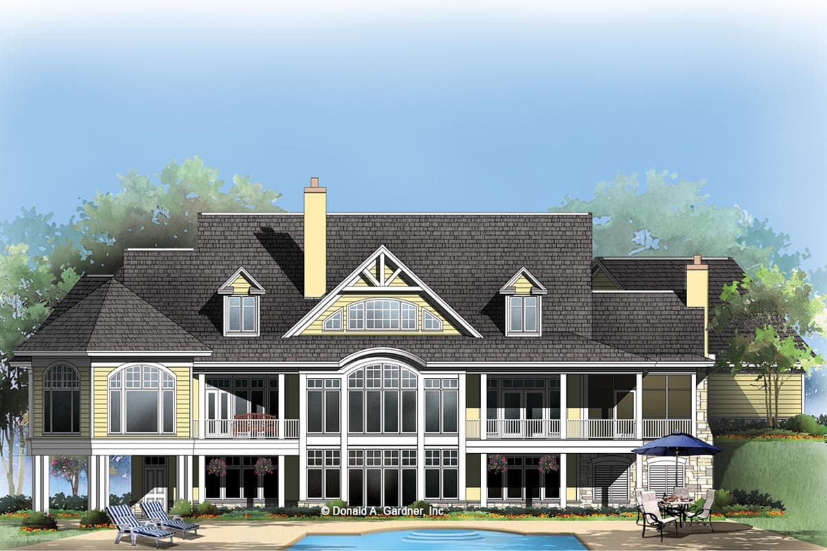 House plan exterior showing a two-story structure with multiple gables, dormers, balconies, and a large arched window.