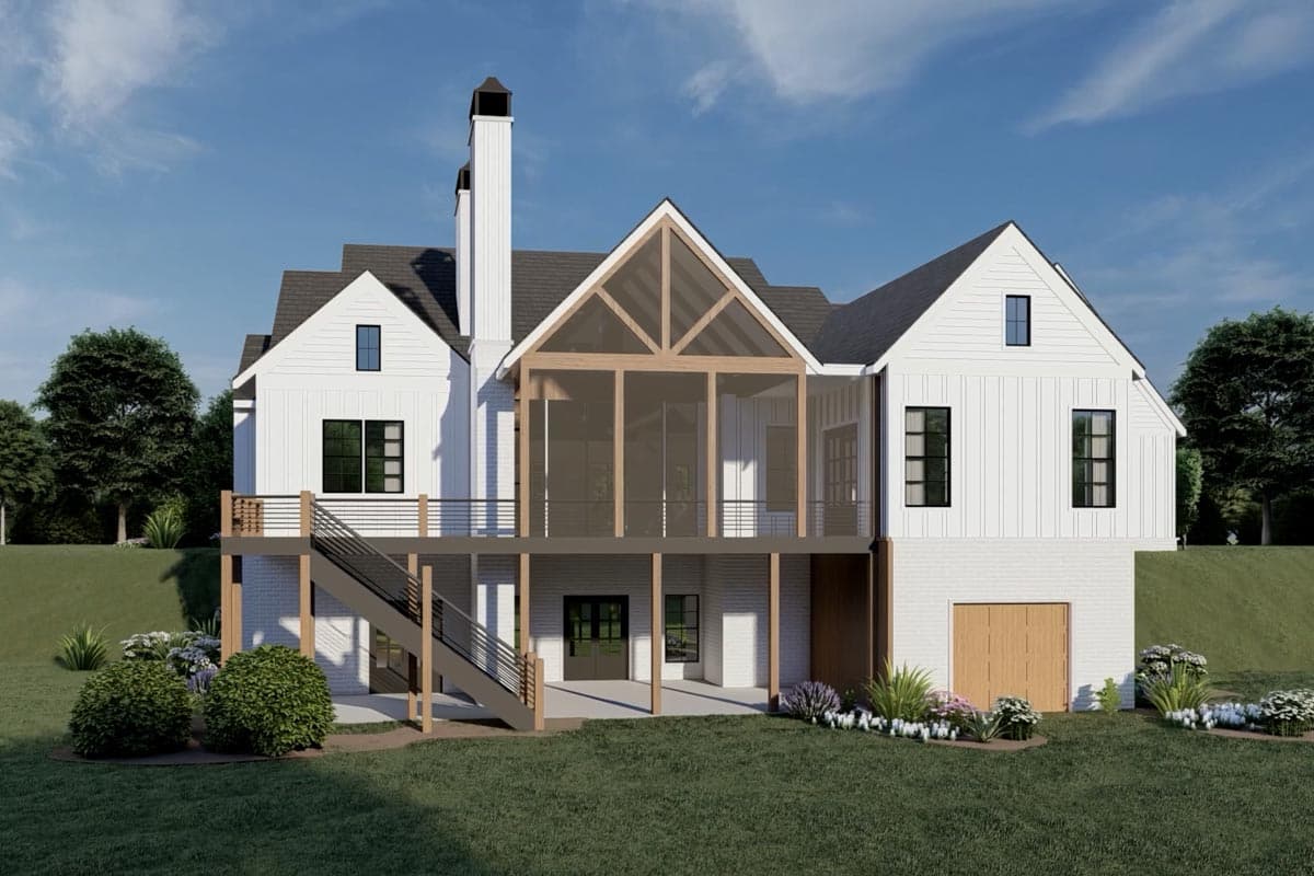 Rear view of a modern farmhouse-style home with a large screened-in porch, white siding, and a deck with stairs leading to the yard.