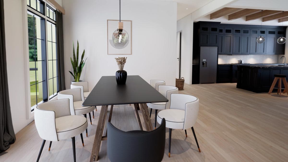 Modern dining room with a long black table and six white chairs. A contemporary kitchen is visible in the background, with a large window to the left.