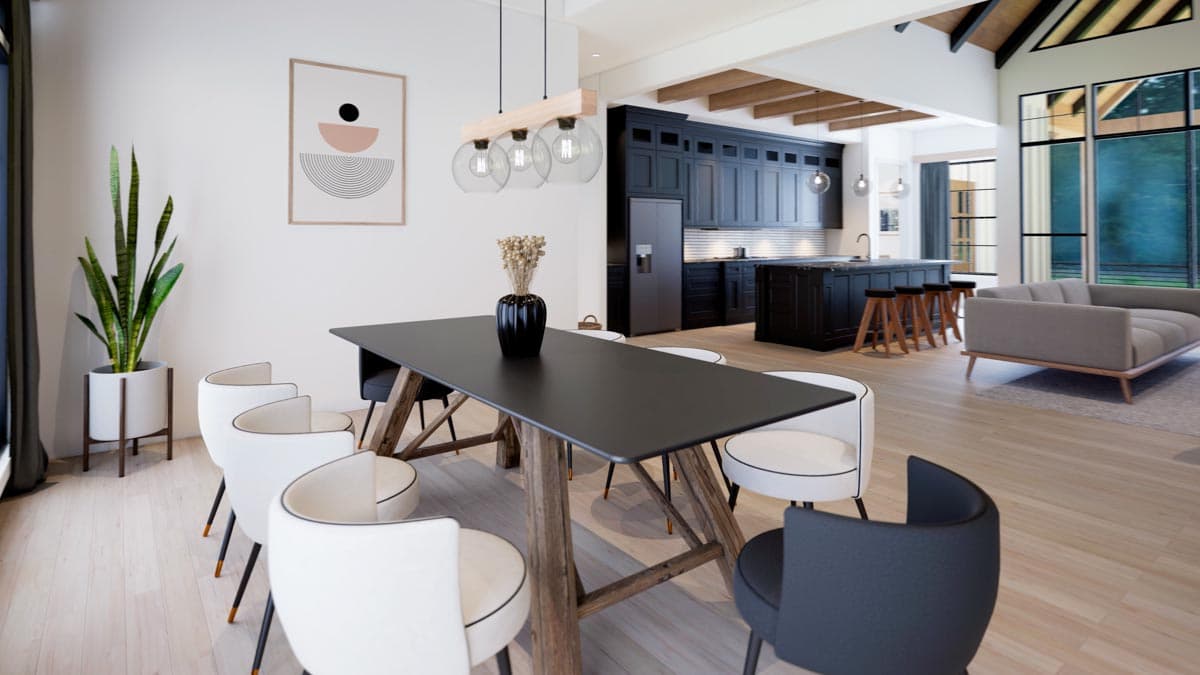 A modern dining room features a long black table with white chairs, a minimalist piece of art, and a dark kitchen in the background.