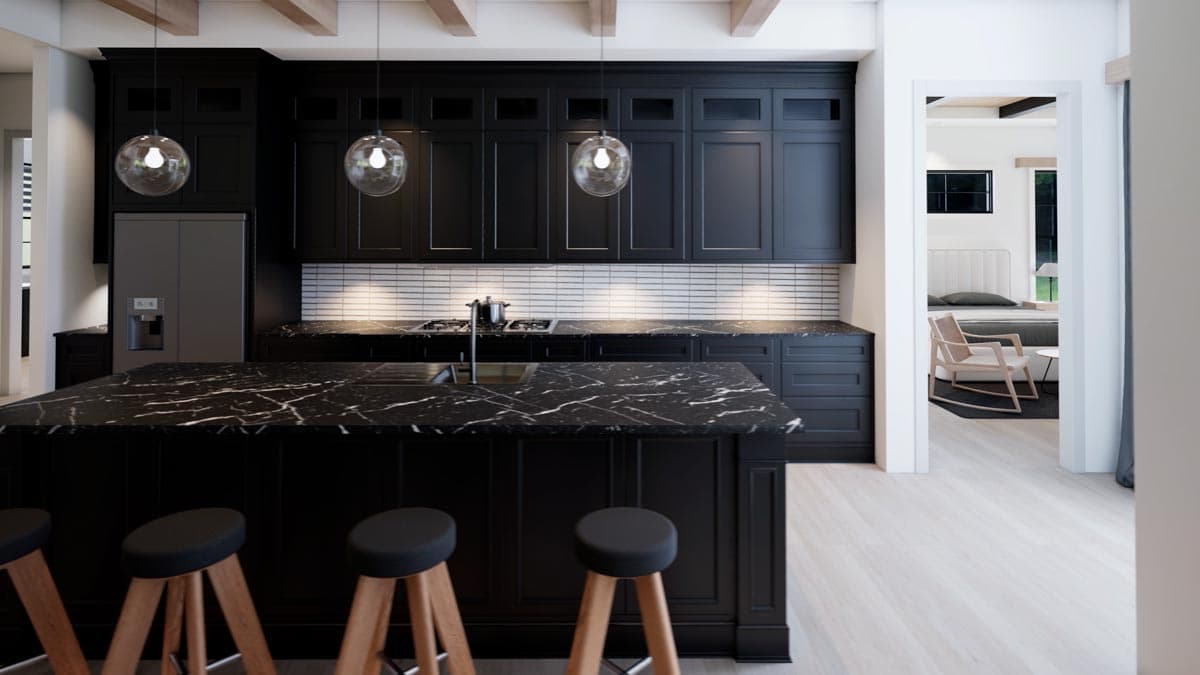 Modern kitchen with black cabinetry, a large marble island with stools, and spherical pendant lights. A bedroom is visible in the background.