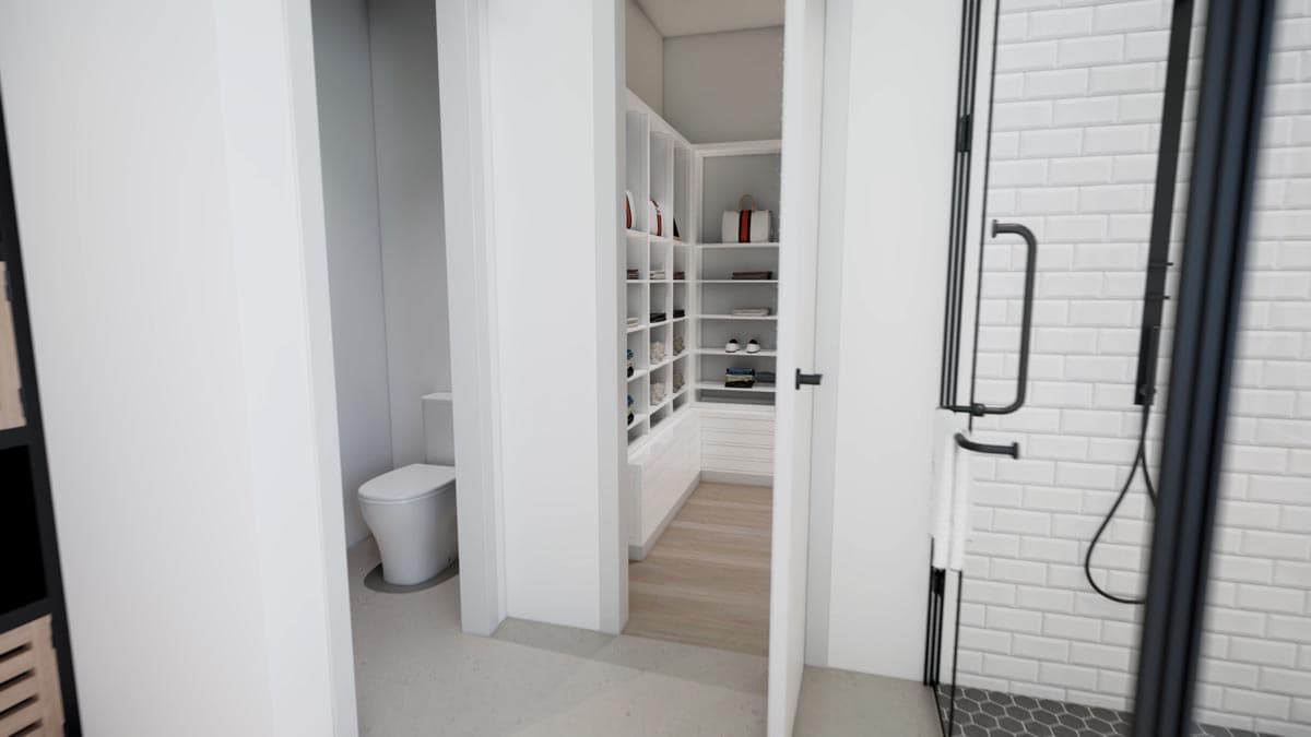 View into a modern bathroom with a closet and a shower. A white toilet is visible in the doorway, along with a walk-in closet with shelves.