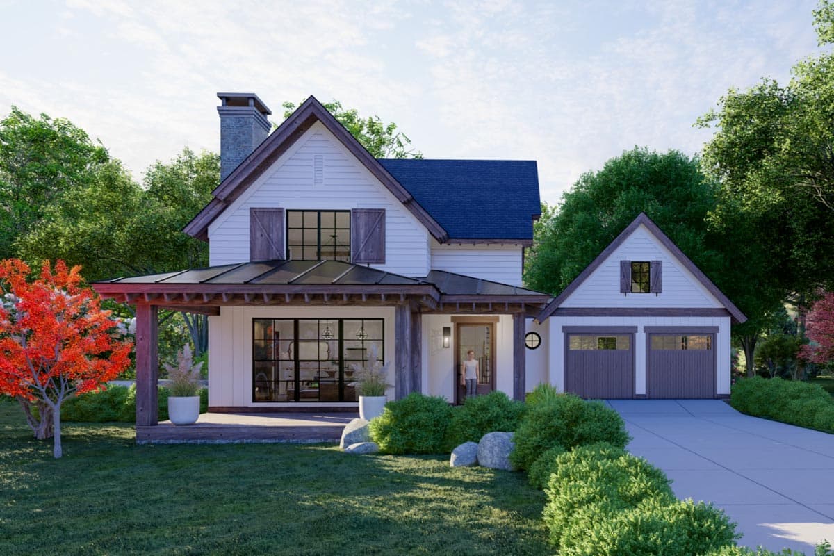 Modern Farmhouse house plan exterior with a covered porch, stone chimney, two-car garage, and large gabled dormer.