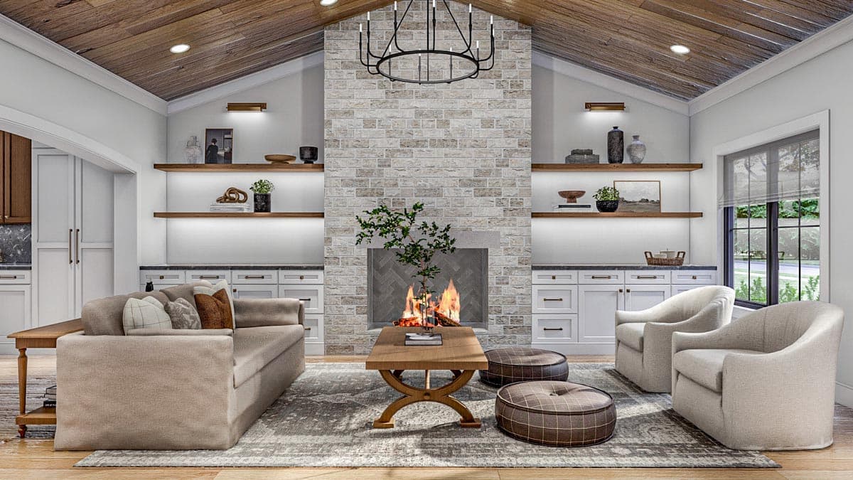 Great room with vaulted wood ceiling, stone fireplace, built-in cabinetry, and seating.