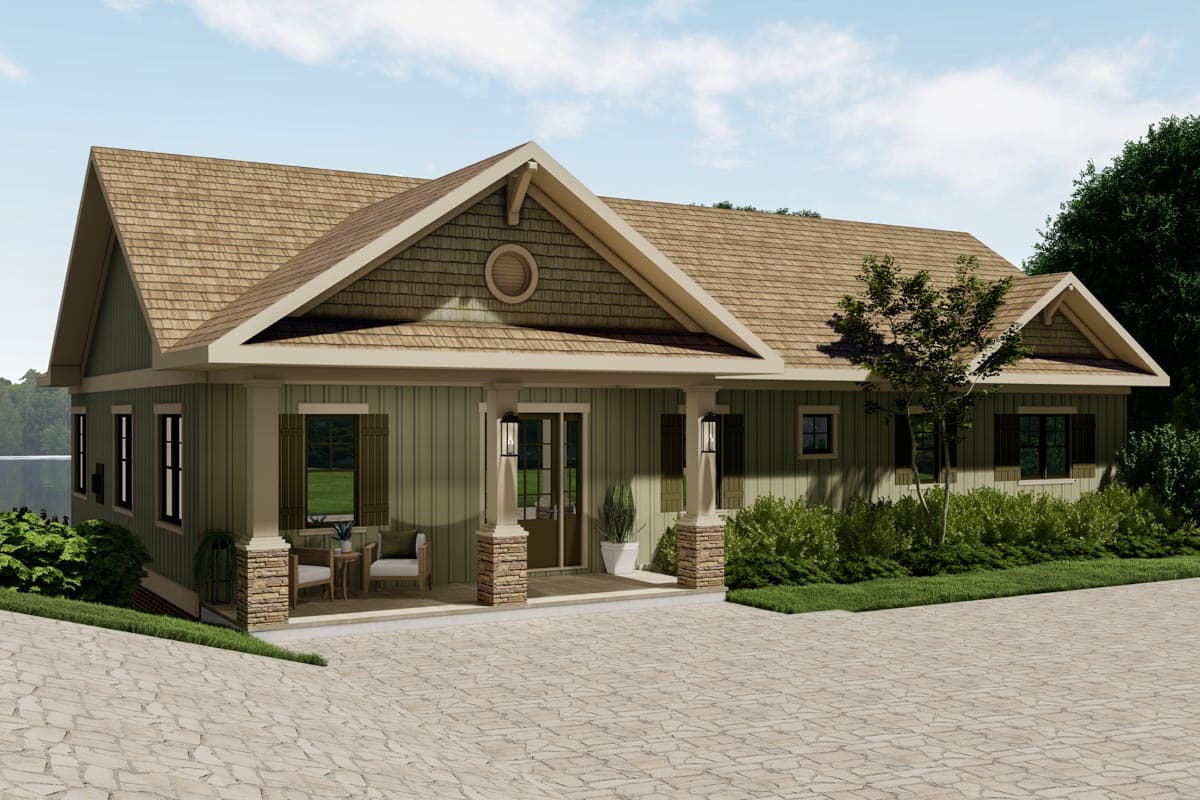 Ranch house plan exterior with a covered front porch featuring stone-clad columns, prominent gables, and cedar shake accents.