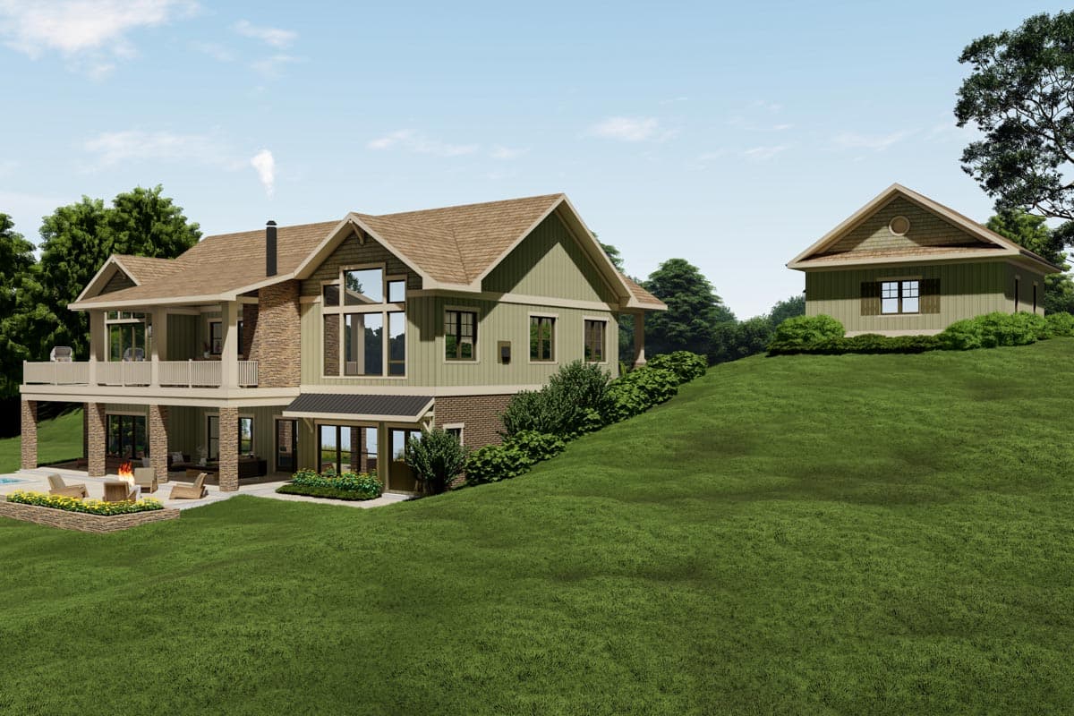 House plan exterior: two-story design with deck, stone accents, large windows, and detached garage.