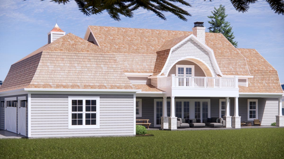 House plan exterior with gambrel roof, dormers, balcony, and attached garage. Features cedar shake roofing.