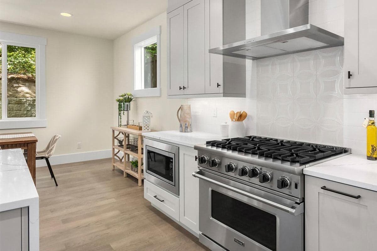 Plan 23069JD: Modern 4-Bed House Plan Under 3200 Square Feet with Drive-Under 2-Car Garage - Image #11 - Contemporary, Modern, Northwest