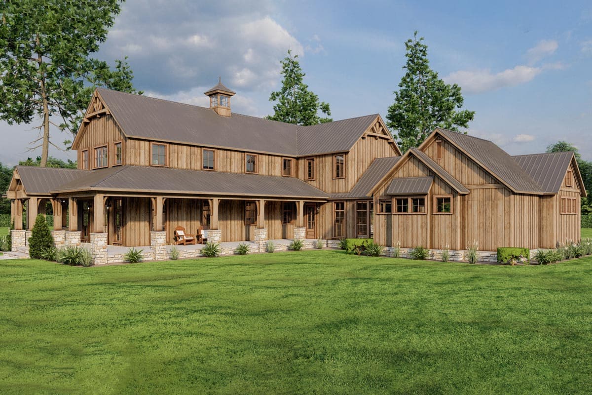 Modern Farmhouse house plan exterior with a wraparound porch, metal roof, dormers, and stone foundation.
