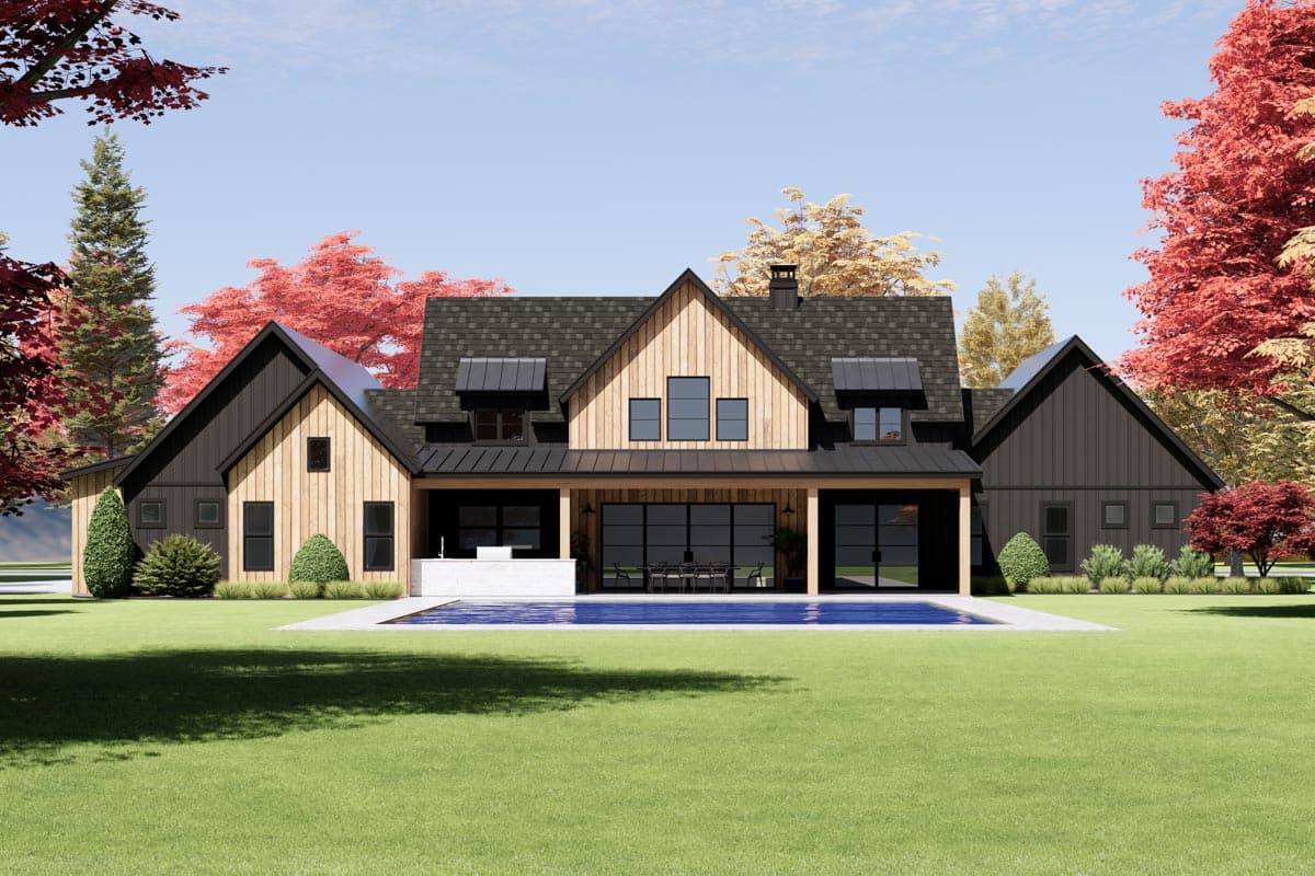 Modern Farmhouse house plan exterior with wood siding, multiple gables, a covered patio, and a swimming pool.