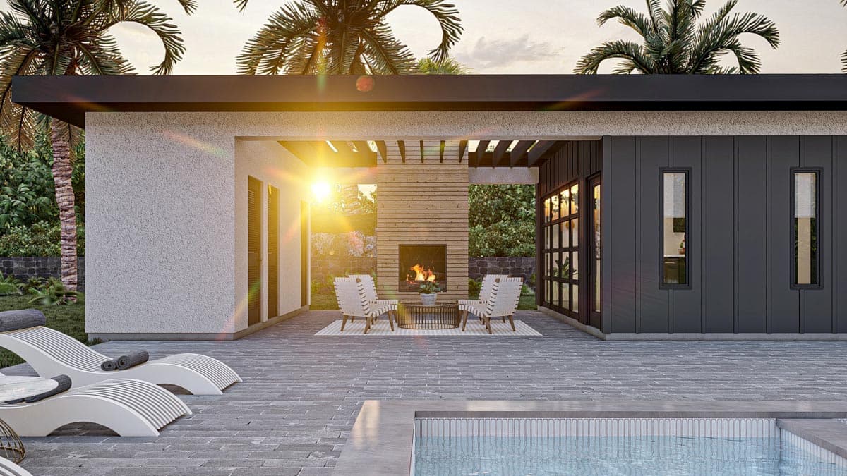 Modern house exterior with outdoor fireplace, covered patio, and swimming pool.
