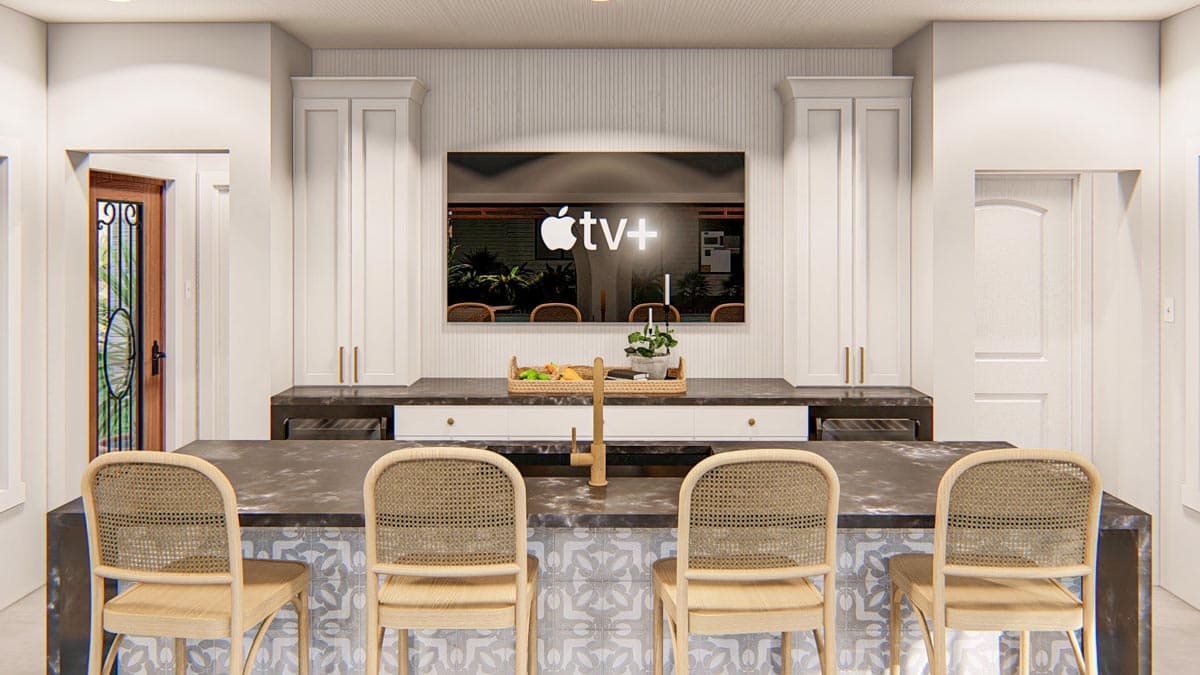 Modern kitchen island with seating, dark countertop, pendant lights, and integrated television.