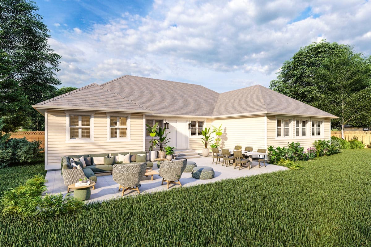 House plan exterior: single-story home with gable roof, visible backyard patio with seating and dining areas.