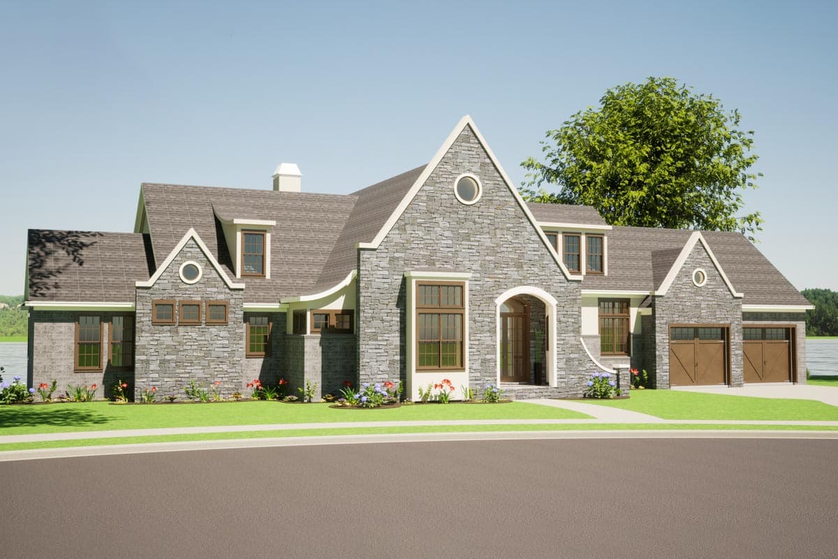 House plan exterior: stone veneer, multiple gables, arched entry, dormers, and a side-facing three-car garage.