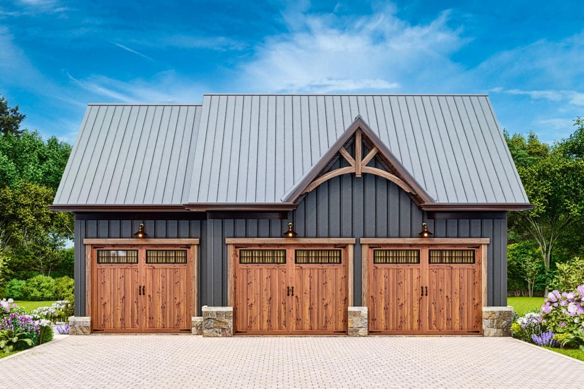 House plan exterior featuring a three-car garage with wooden doors, metal roof, and decorative gable truss.
