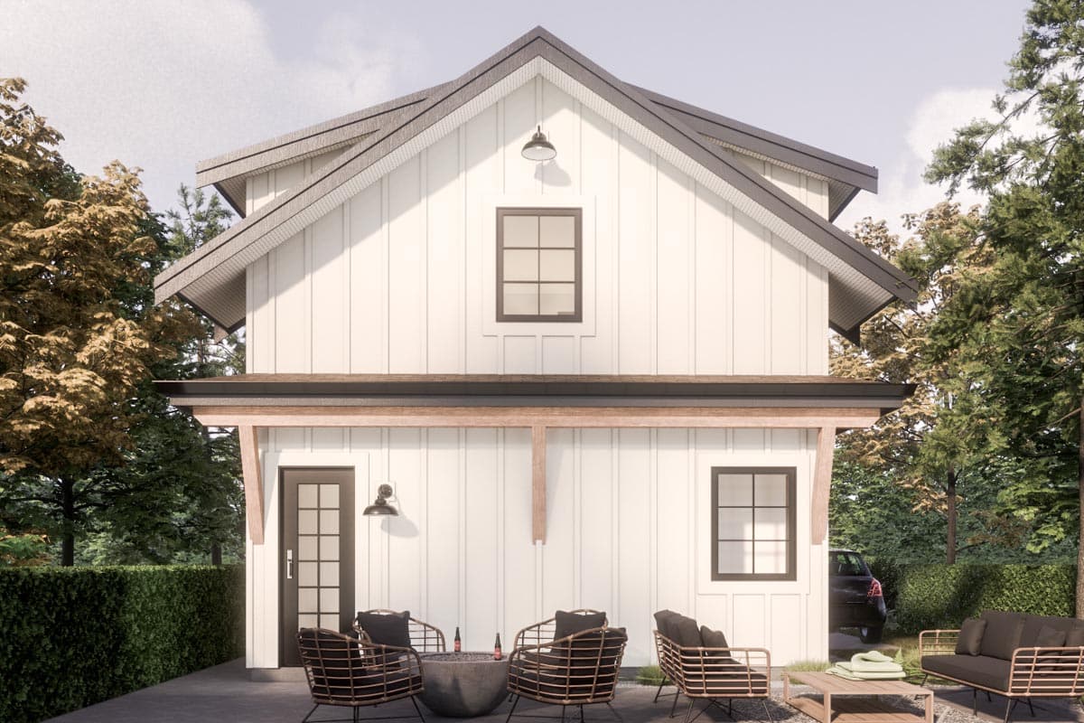 Modern Farmhouse house plan exterior with board and batten siding, steep gabled roof, and minimal windows.