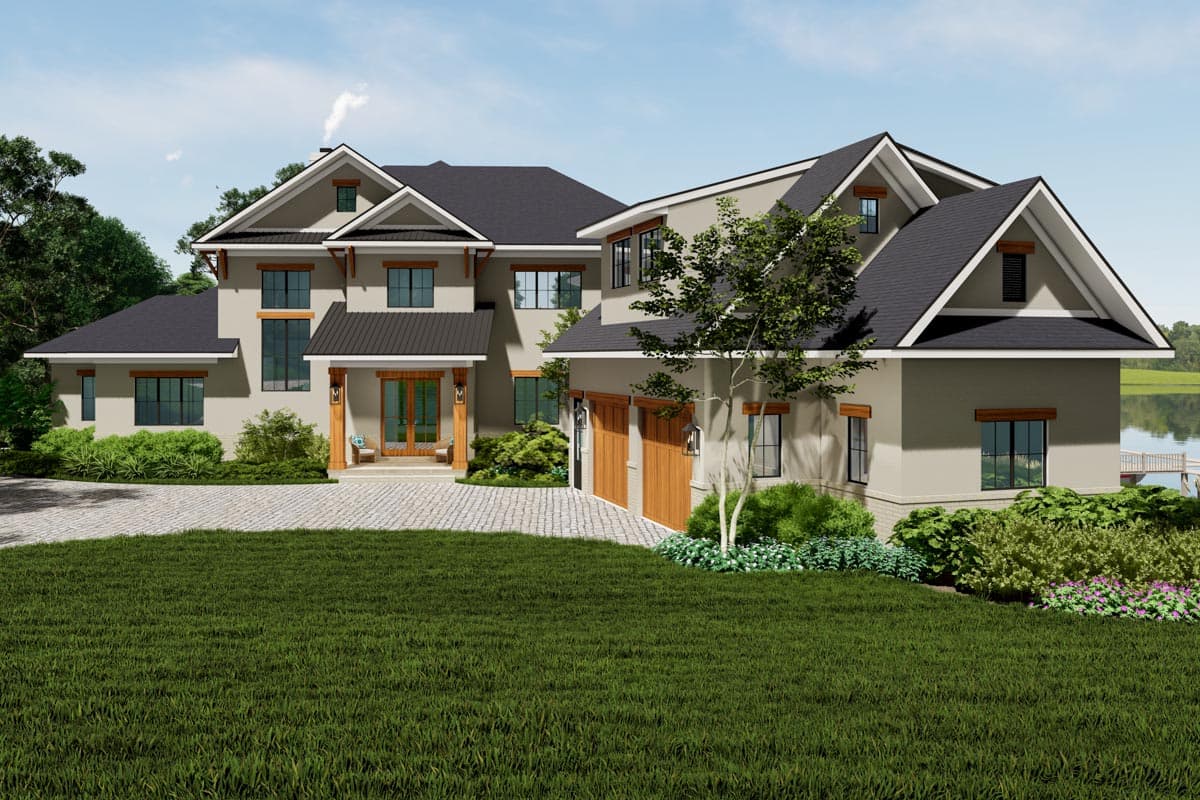 House plan exterior: Modern two-story home with gabled rooflines, dormers, a covered entry porch, and a three-car garage.