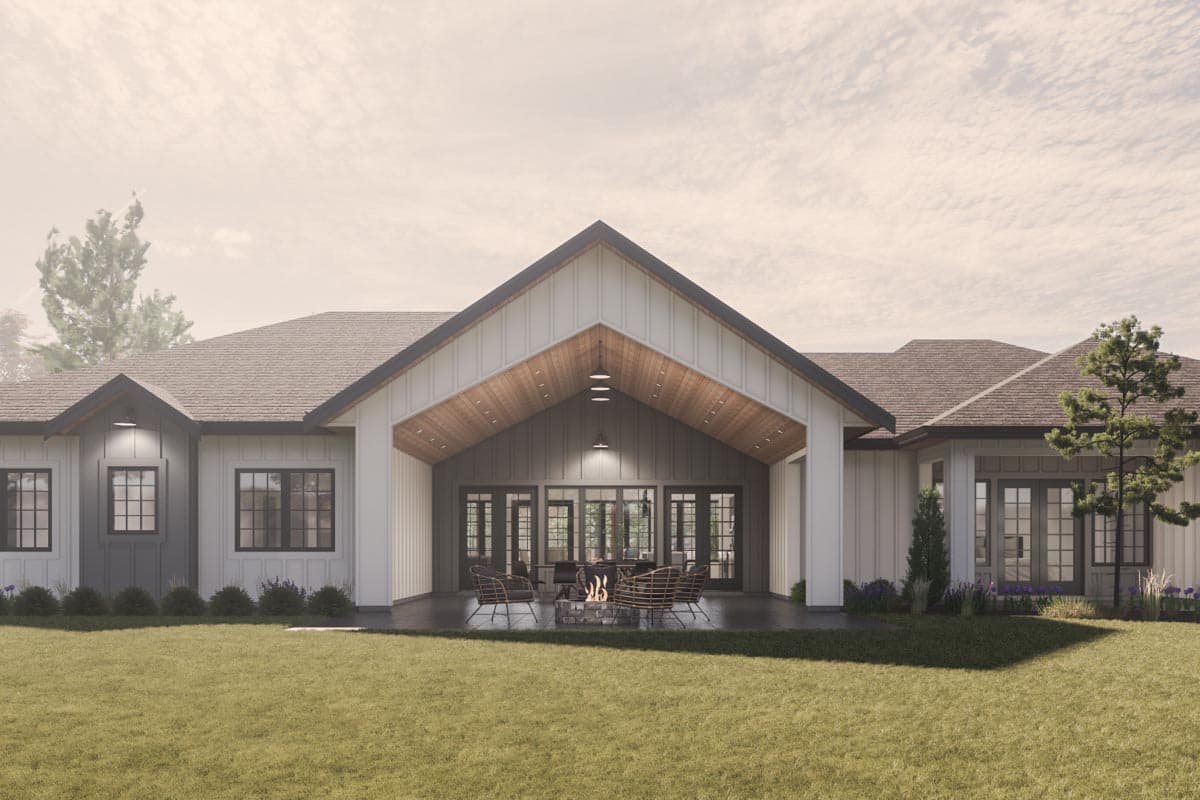 House plan exterior: Modern Farmhouse, one story, with covered patio, large gables, and board-and-batten siding.