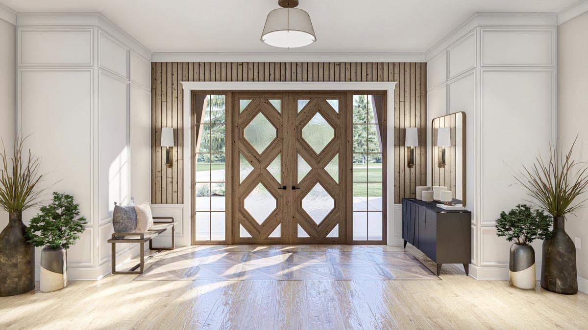 Entryway with double wooden doors featuring geometric glass panes, paneled walls, and wood plank accent.
