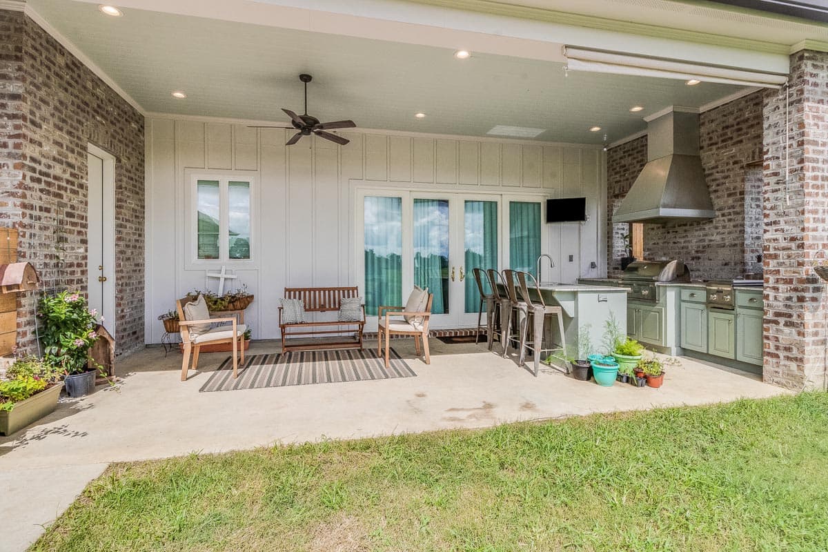 Plan 125002LEW: 2259 Square Foot Acadian-Style Farmhouse Plan with Outdoor Kitchen - Image #11 - Acadian, Country, Farmhouse, Modern Farmhouse, New American, Southern, Southern Traditional, Traditional