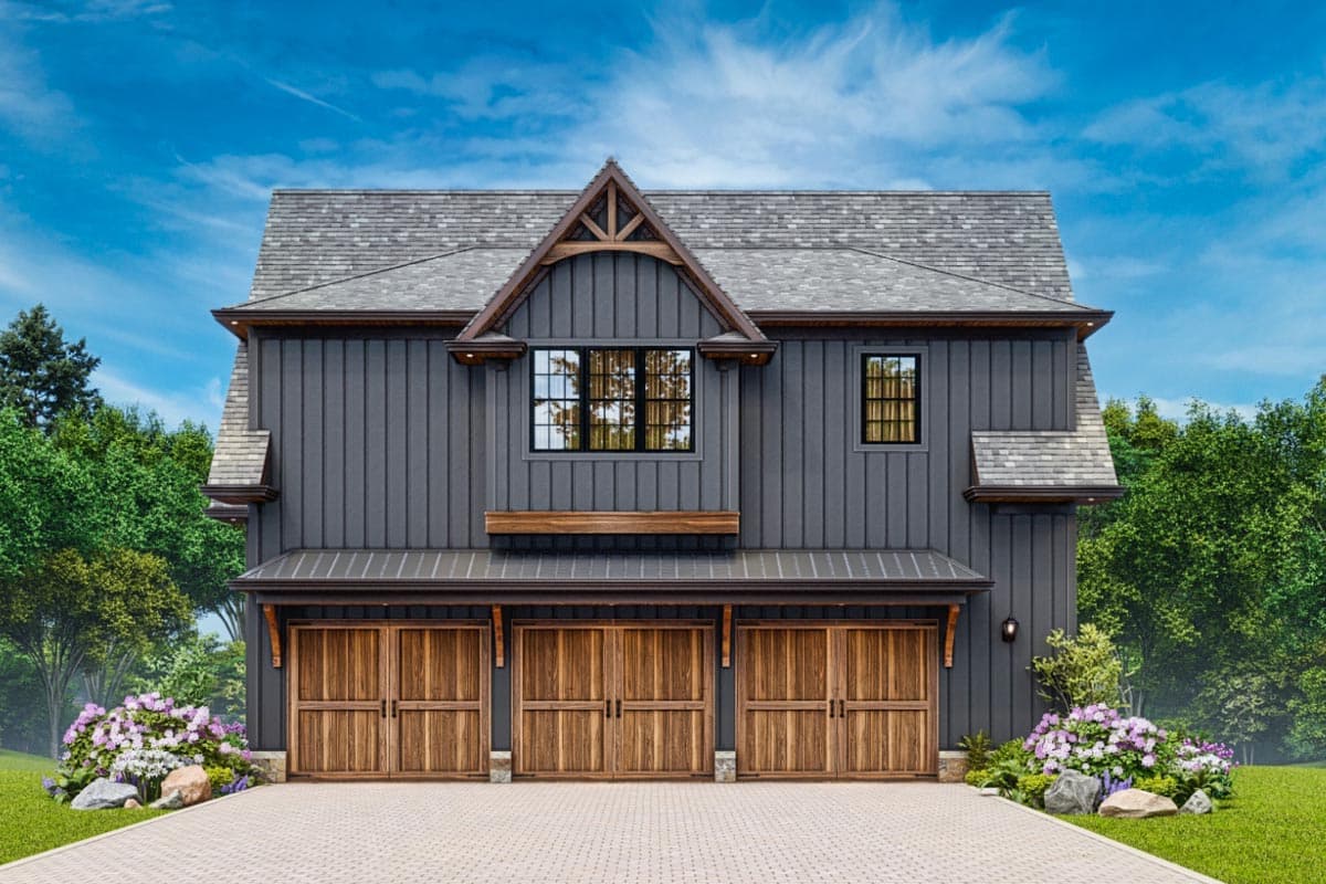 Modern Farmhouse style house plan exterior with three wood garage doors, vertical siding, and a prominent gable with timber accents.