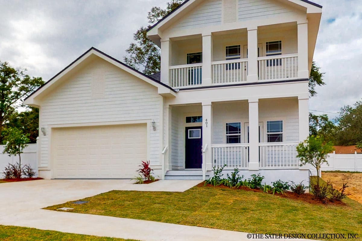 Two-story house plan exterior with front-facing garage, gabled roof, and dual balconies with white railings.