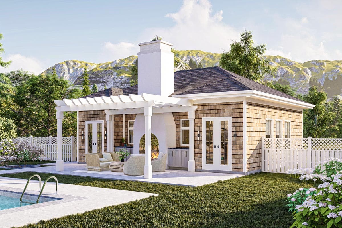 House plan exterior: One-story home with wood shake siding, covered patio with fireplace, double doors, and white lattice fence.