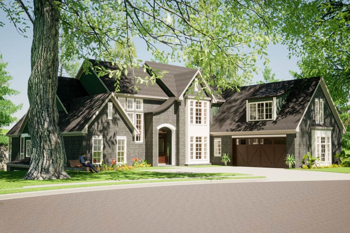 House plan exterior. Two-story with gables, dormers, and a two-car garage. Features include a front entry arch and a dark roof.