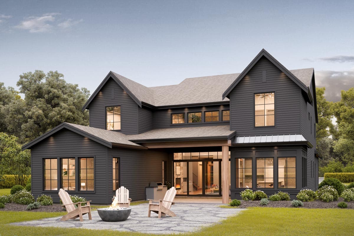 Modern Farmhouse house plan exterior, two stories, dark siding, gabled rooflines, and covered entryway with large glass doors.