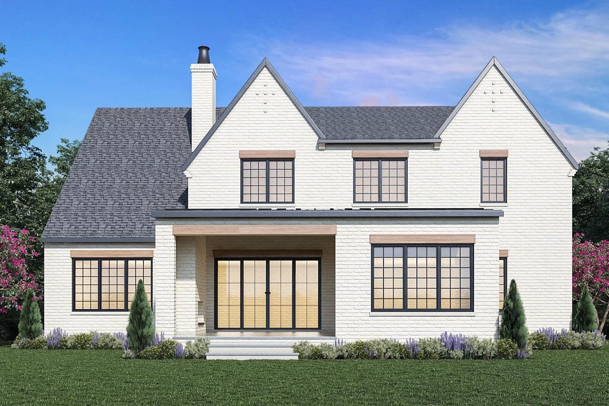 House plan exterior: Two-story Modern Farmhouse with white brick, prominent gables, and a covered entry with large sliding glass doors.