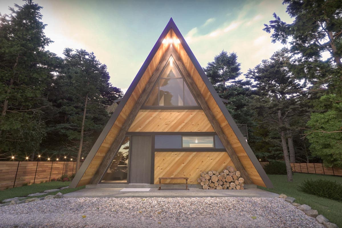A-frame house plan exterior. One-story structure with a triangular roof. Features include wooden siding, a large triangular window, and a small bench.