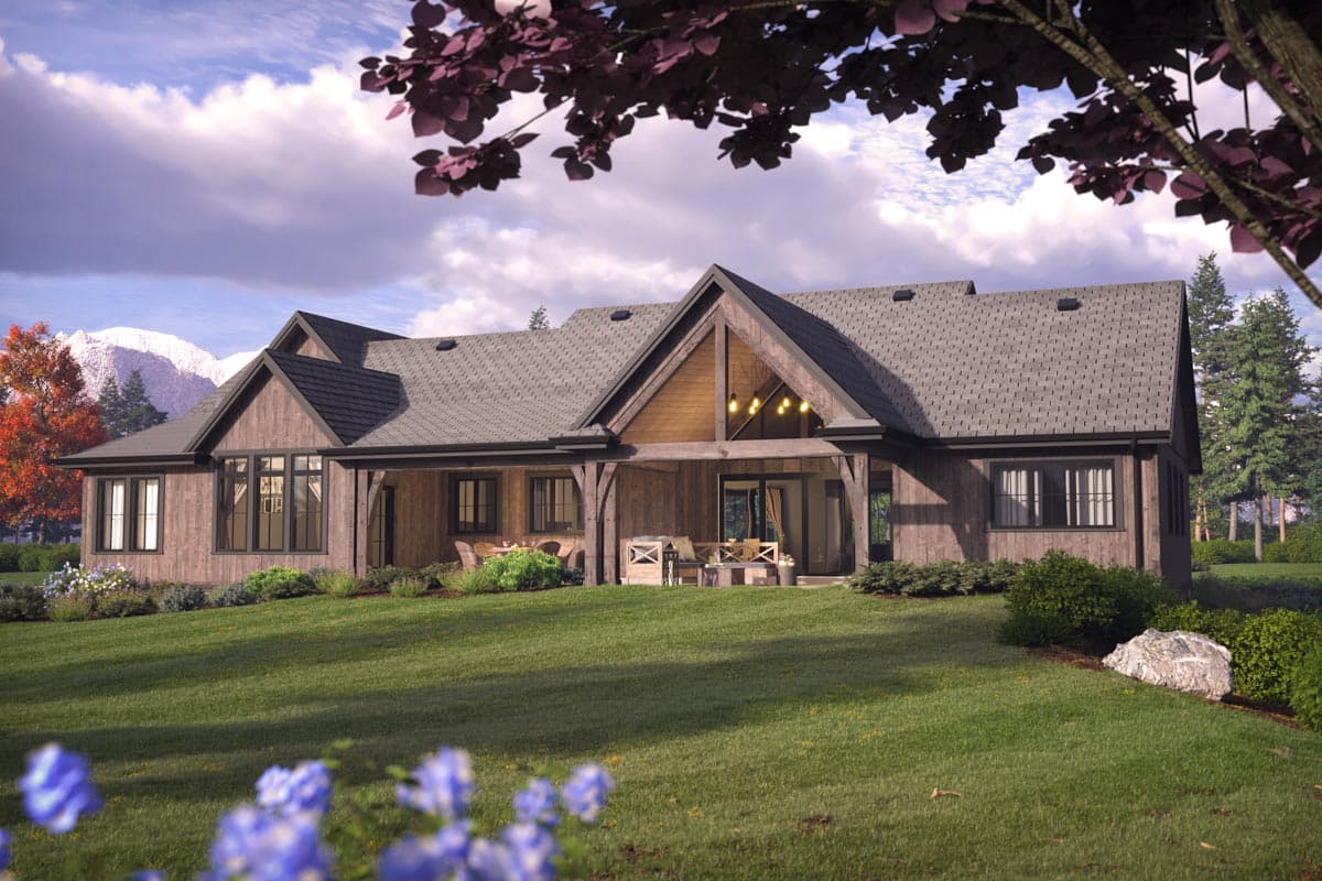 Modern Farmhouse house plan exterior with wood siding, gables, a covered porch, and multiple rooflines.