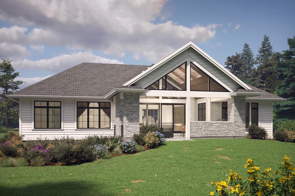 House plan exterior: one-story home with gable roof, stone accents, large windows, and a prominent triangular window.