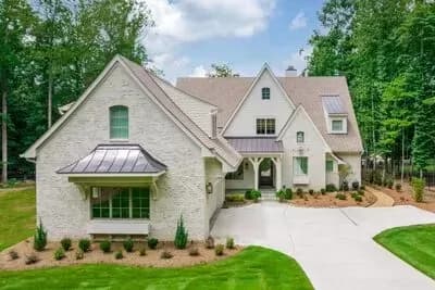 Transitional 2-Story House Plan with Private Apartment Above Garage