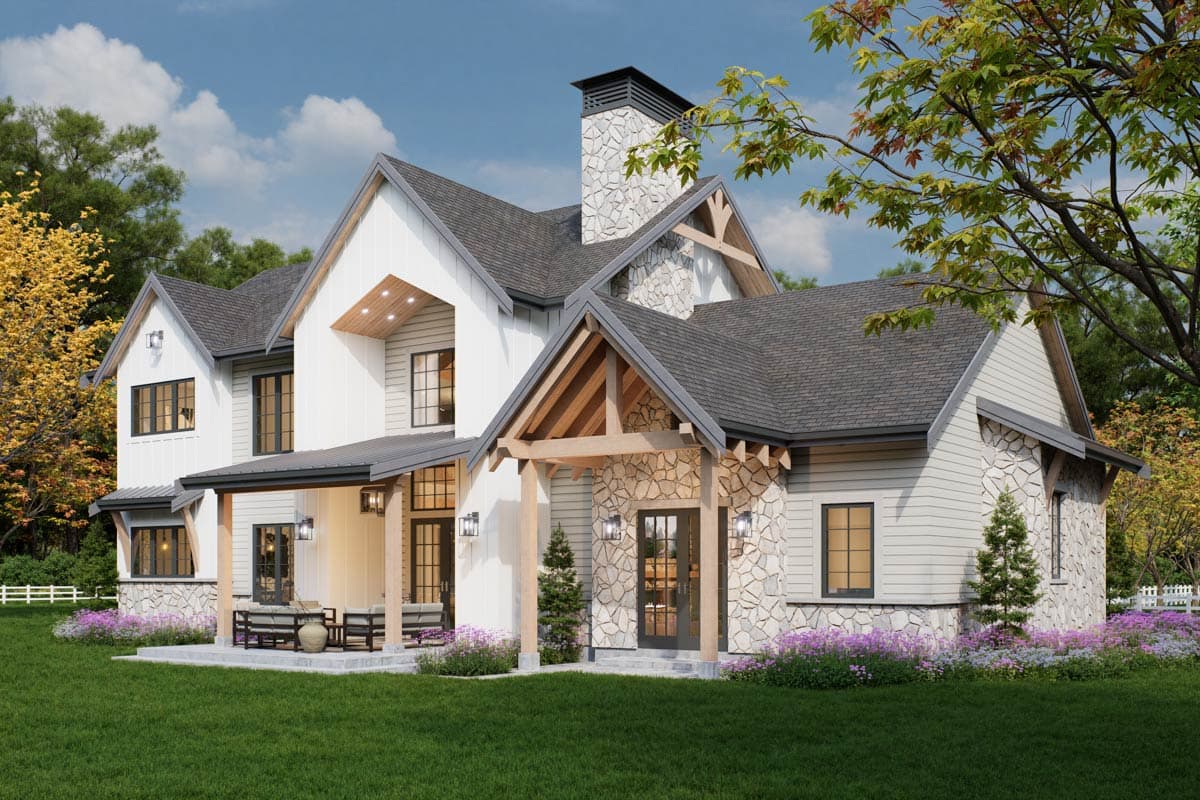 House plan exterior: Modern Farmhouse style, two stories, stone accents, covered porch, and prominent gables.