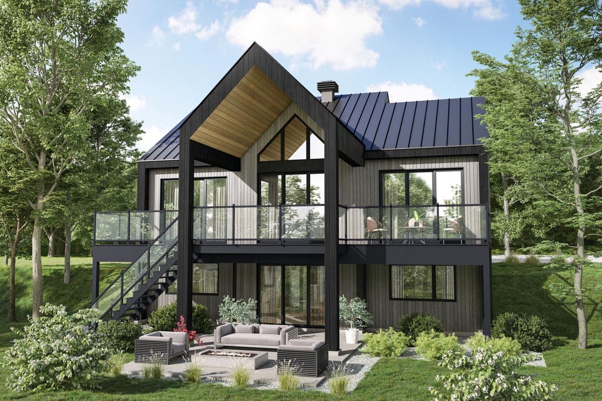 House plan exterior. Two-story modern house with a shed roof, a glass balcony, and a covered entryway. Features include dark siding and large windows.