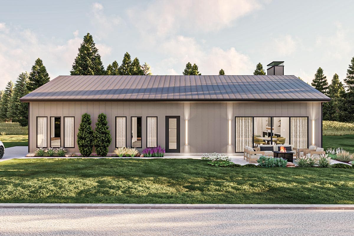 Modern ranch house plan exterior with metal roof, vertical siding, large windows, and patio with fire pit.