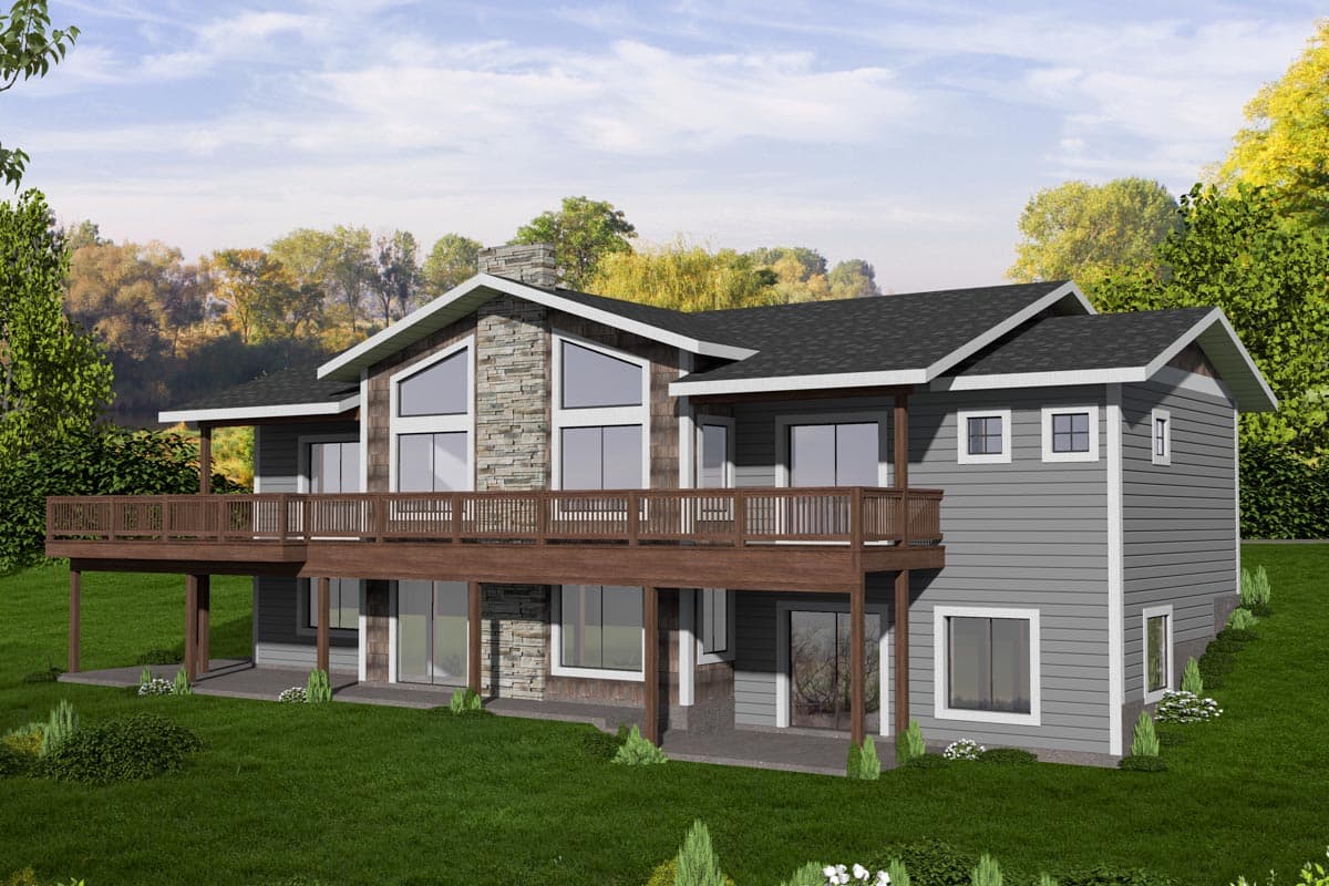House plan exterior with two stories, gabled roof, stone chimney, and wraparound deck.