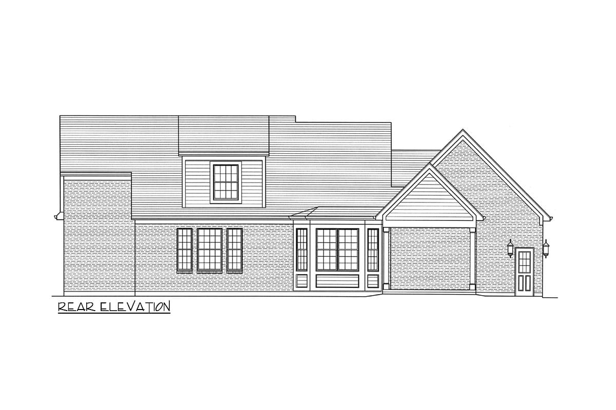 Rear elevation drawing of a house plan featuring a brick exterior, multiple window configurations, a dormer, and a gabled entryway.