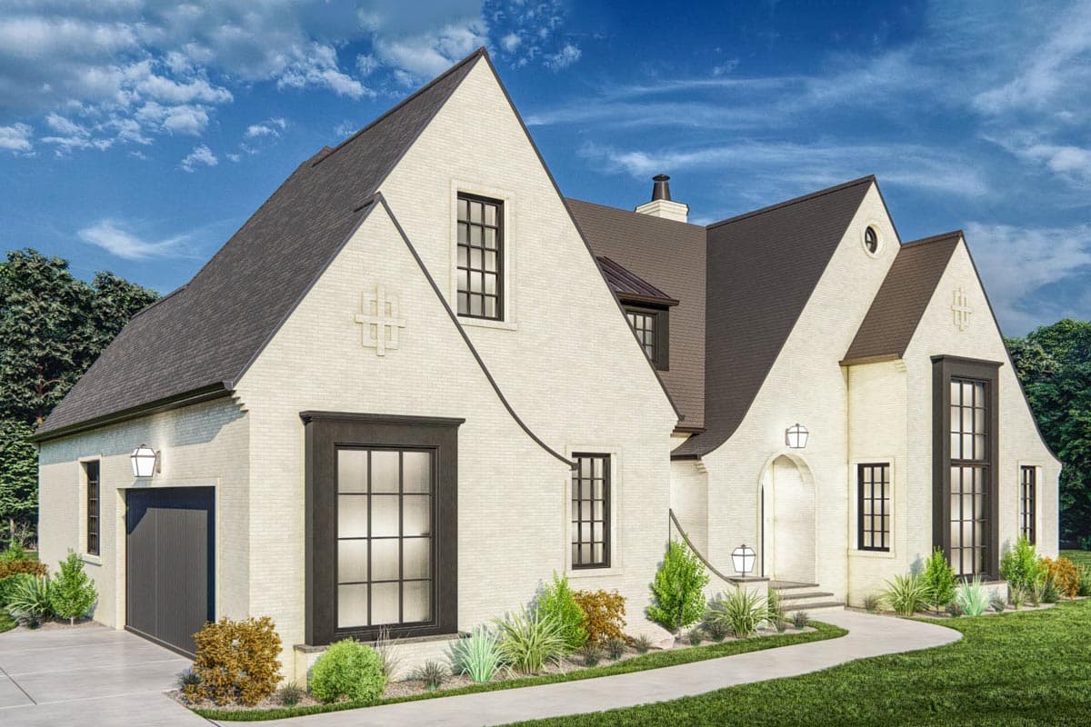House plan exterior: two-story, white brick, dark-trimmed windows, gables, arched entryway, attached garage.