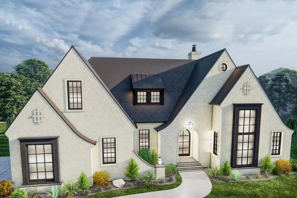 House plan exterior: White brick, two stories, gables, arched entry, and dark-framed windows.