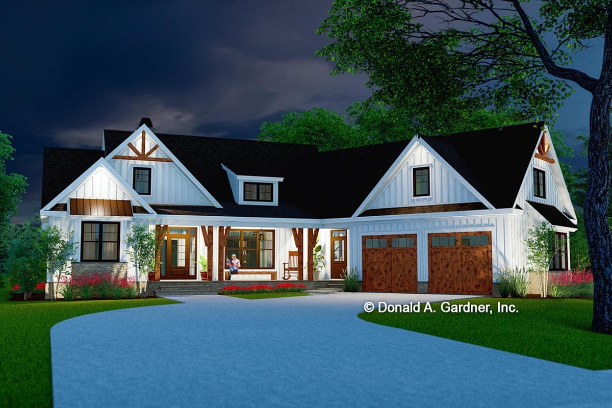 Modern Farmhouse house plan exterior with wraparound porch, gables, and a side-entry two-car garage.