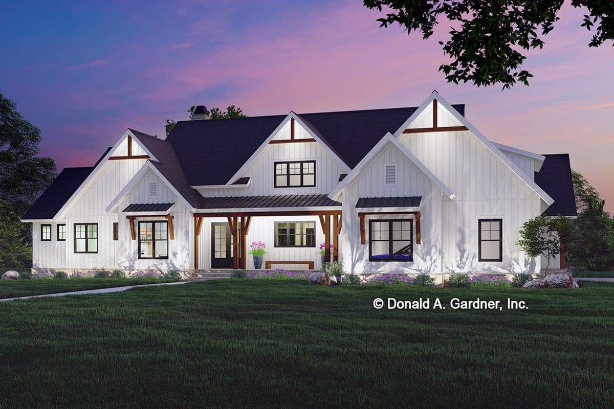 Modern Farmhouse style house plan exterior with white board and batten siding, gabled dormers, and a covered front porch with timber supports.
