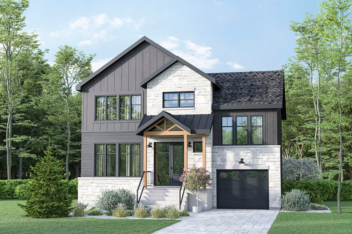 A modern two-story home with gray siding, stone accents, and a black garage door. The house is surrounded by green trees and a well-manicured lawn.