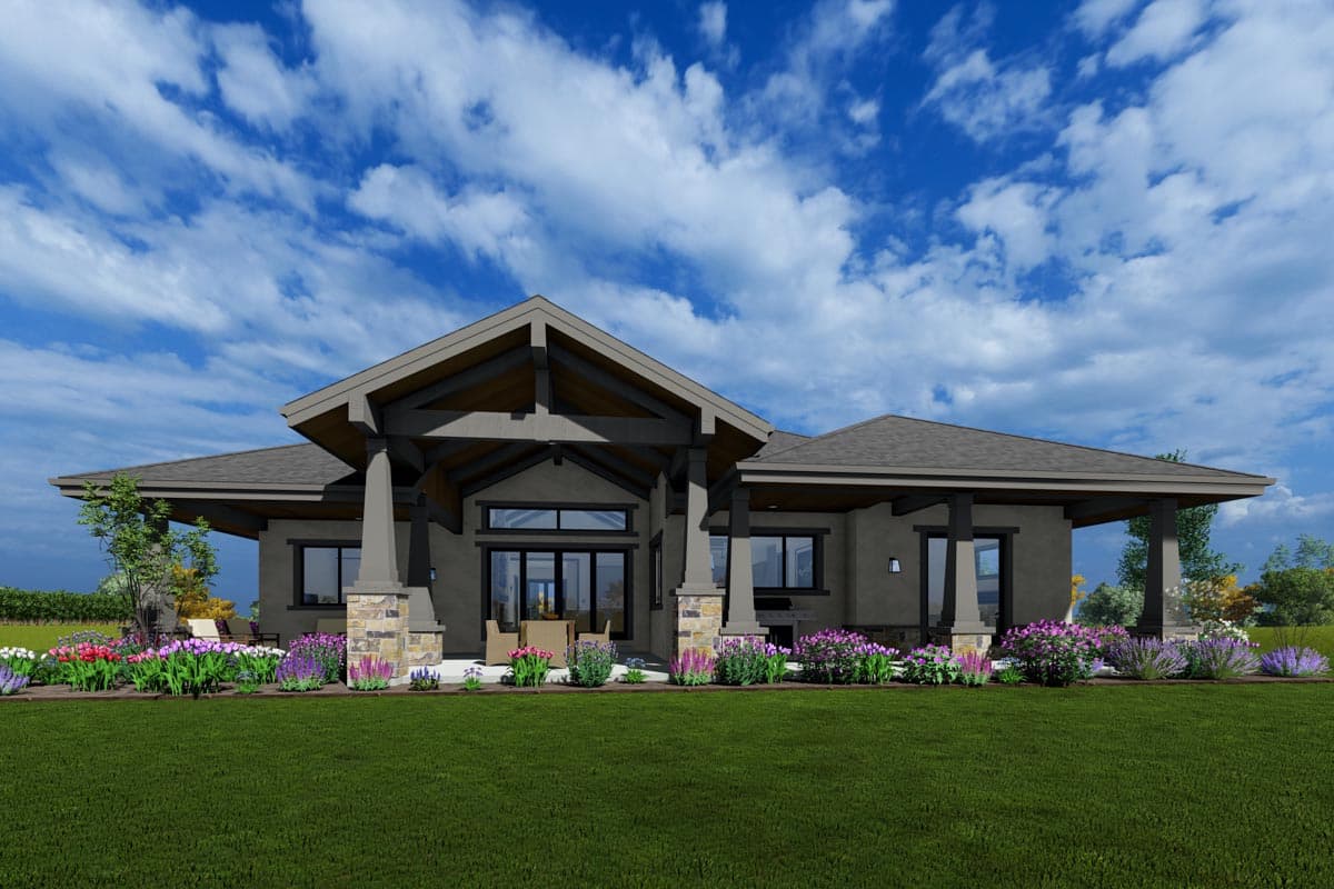 House plan exterior: Ranch style, single-story home with covered patios, exposed beams, and stone accents.